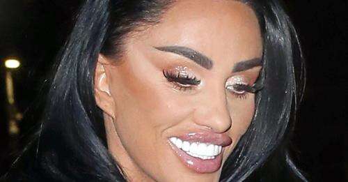 Katie Price shows off her very plump lips with JJ Slater